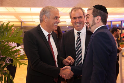 Asher with the Minister of Finance of the State of Israel, Mr. Moshe Kahlon